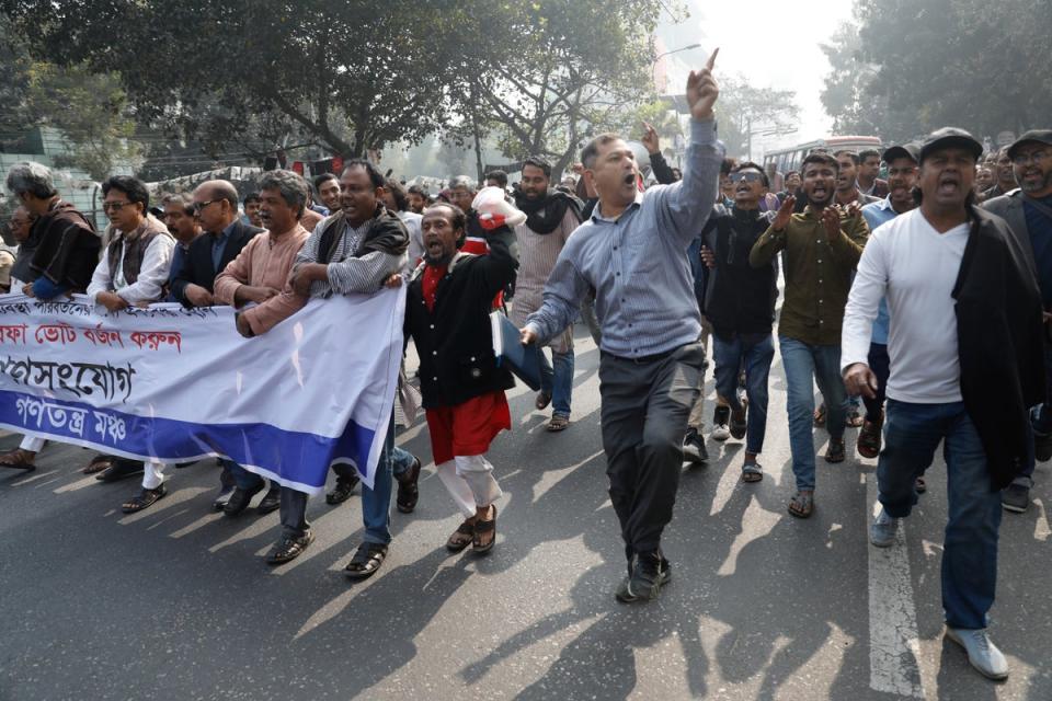 Gono Odhikar Porishod supporters hold a protest against the election boycott call by the main opposition party, and demanded for free and fair elections (AP)