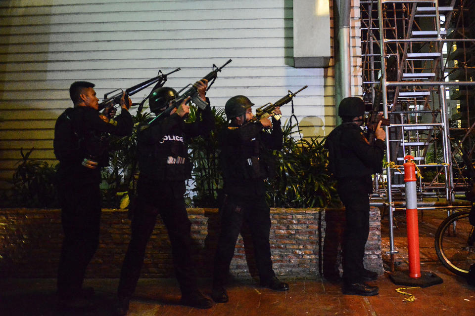 <p>Filipino elite Police Special Weapons and Tactical (SWAT) personnel take their position outside the Resort World Manila hotel in Pasay city, south of Manila, Philippines, June 2, 2017. (Photo: Ezra Acayan/EPA) </p>