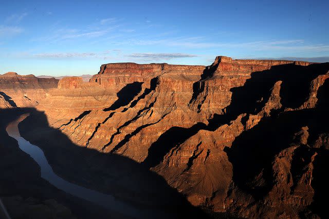 <p>Justin Sullivan/Getty Images</p> he Colorado River winds its way along the West Rim of the Grand Canyon in the Hualapai Indian Reservation.