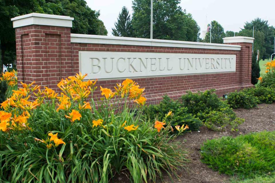 <p>Education Images/Universal Images Group via Getty</p> Sign for Bucknell University in Lewisburg, Penn.