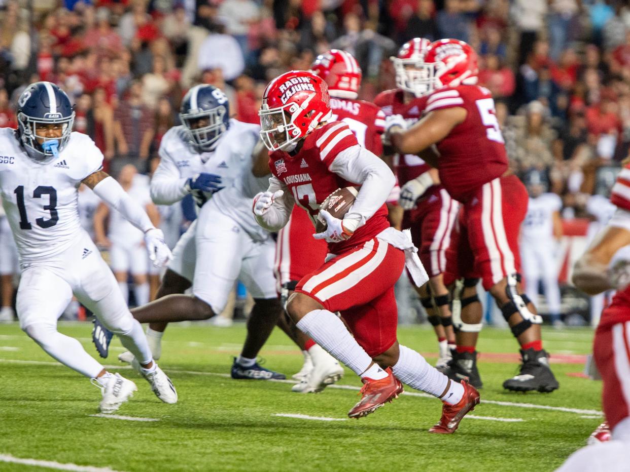 Louisiana running back Chris Smith looks for yardage in the Ragin' Cajuns' game against Georgia Southern on Nov. 10. Louisiana, which has won the last two Sun Belt championships, needs to beat Texas State in Saturday's regular-season finale to become bowl-eligible.