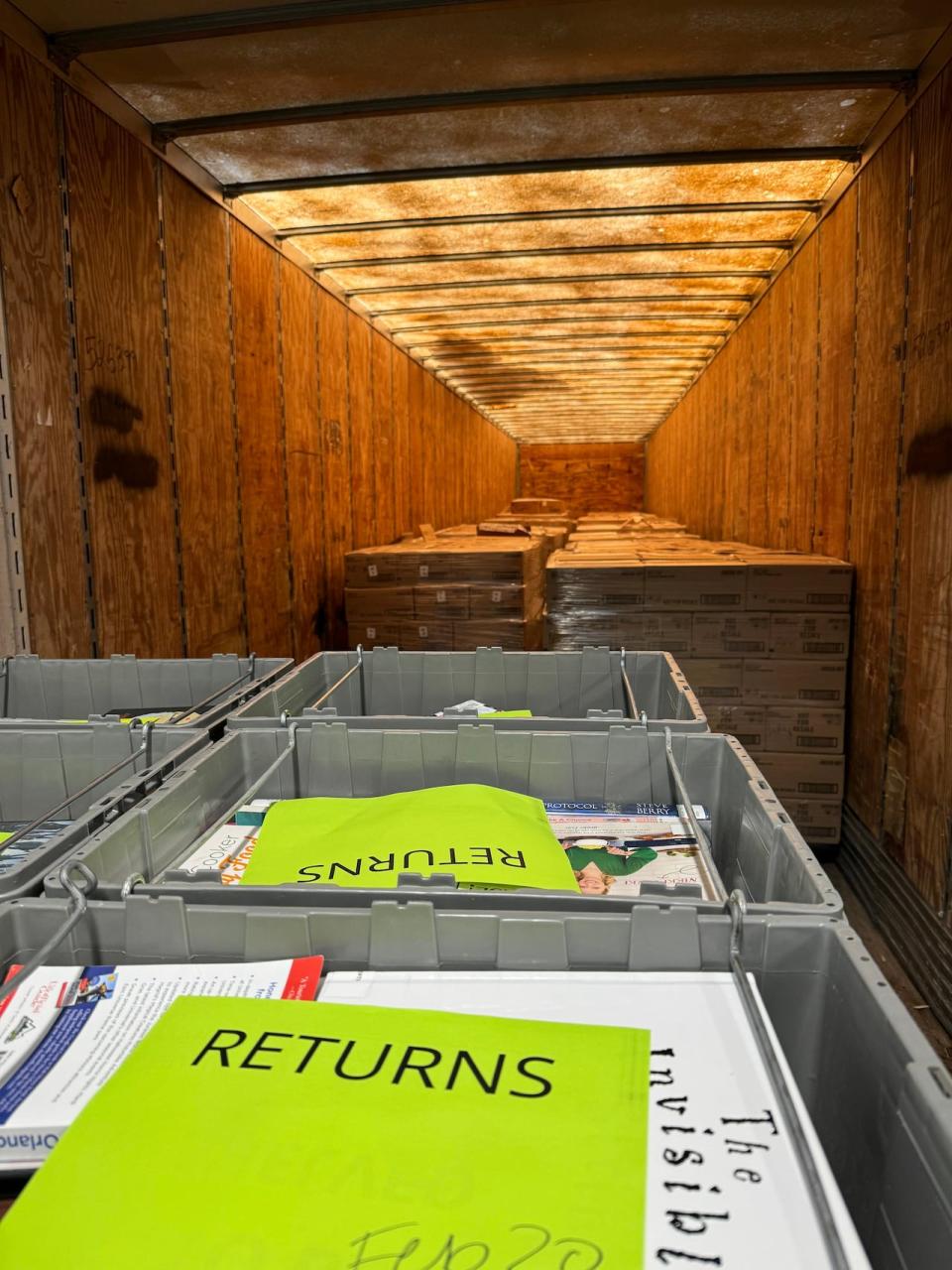 Books are held in a tractor-trailer awaiting return to the shelves of the Toronto Public Library in Feburary 2024, following a ransomware attack against the library the previous fall. 