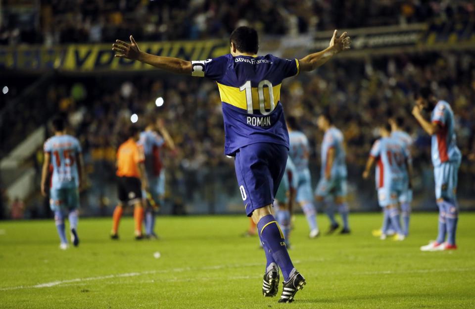 Festejo de Juan Roman Riquelme de Boca Jrs 2-1.<br />
Boca Juniors vs Arsenal.<br />
Futbol Argentino - Torneo Final 2014.<br />
27 de abril de 2014.<br />
Fecha 16.<br />
Estadio: Alberto J. Armando (Bombonera).<br />
Foto: Javier Garcia Martino / Photogamma.<br />
6473 Foto: Javier Garcia Martino / Photogamma (00006473-23)