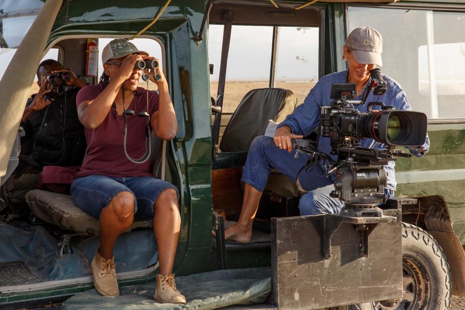 Queens’ director Faith Musembi and director of photography Sophie Darlington film elephants from the vehicle.