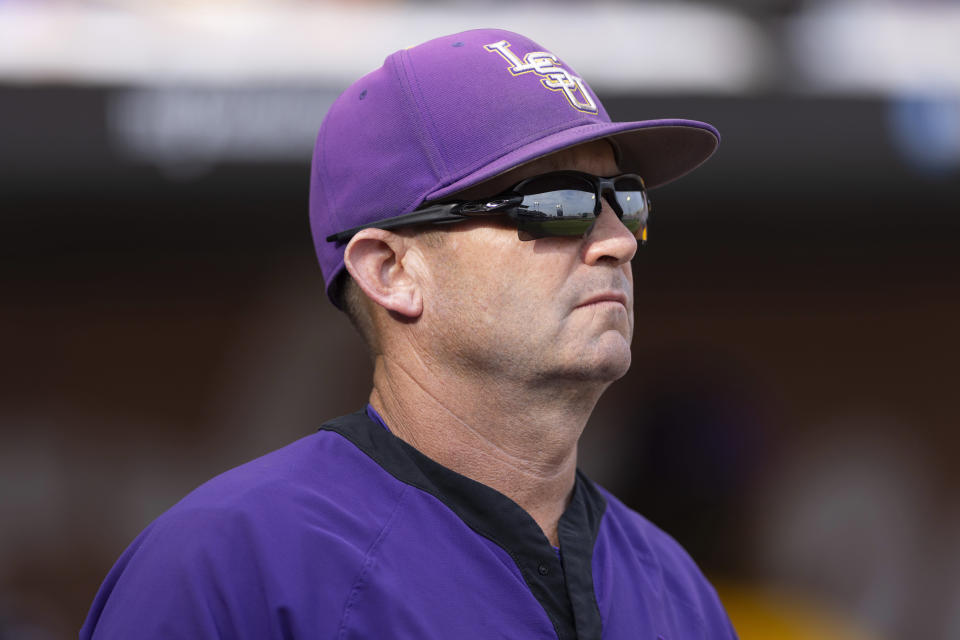 LSU coach Jay Johnson stands in the dugout before the team's baseball game against Wake Forest at the NCAA College World Series in Omaha, Neb., Wednesday, June 21, 2023. (AP Photo/Rebecca S. Gratz)