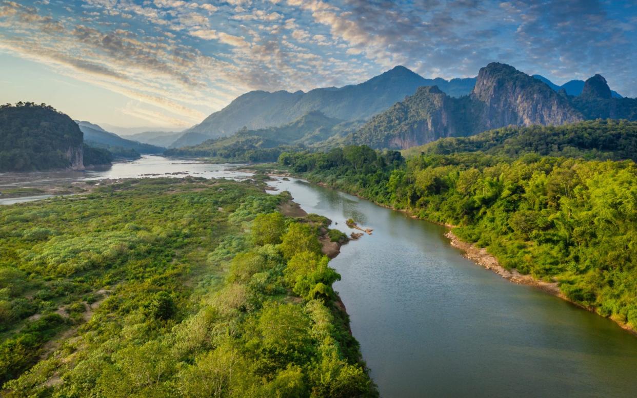 The beautiful Mekong river opens up destinations in Southeast Asia - ALEXANDER HAFEMANN