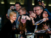 Nicole Kidman poses with fans as she arrives for the gala screening of the film "Lion", during the 60th British Film Institute (BFI) London Film Festival at Leicester Square in London, Britain October 12, 2016. REUTERS/Peter Nicholls
