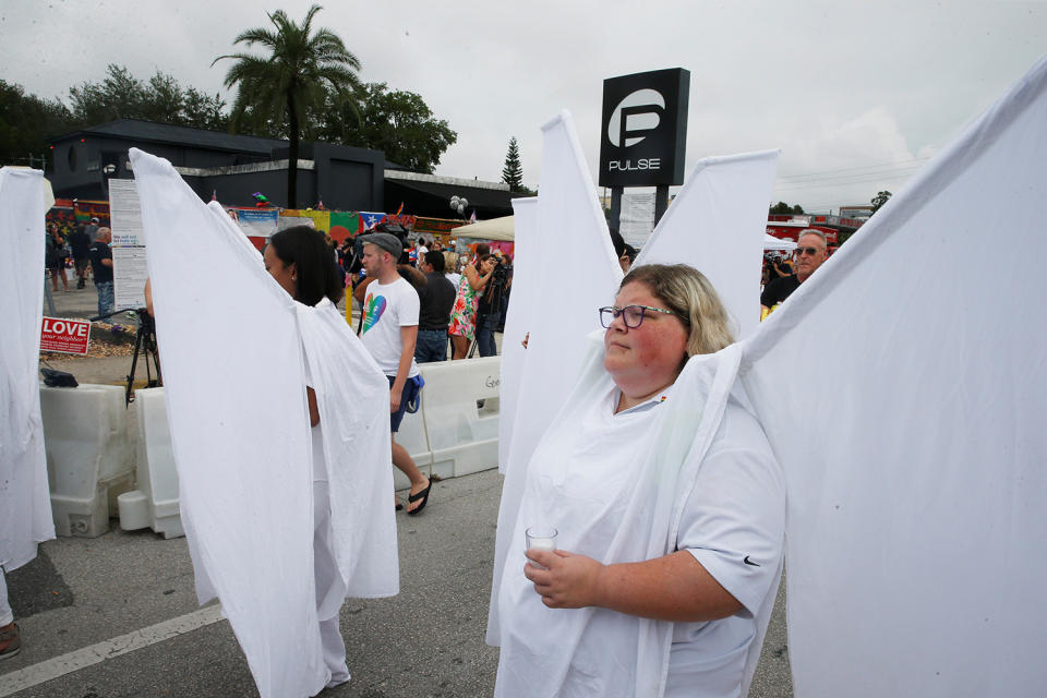 <p>The Pulse Angels march to the memorial outside the Pulse Nightclub on the one-year anniversary of the shooting in Orlando, Florida, June 12, 2017. (Scott Audette/Reuters) </p>
