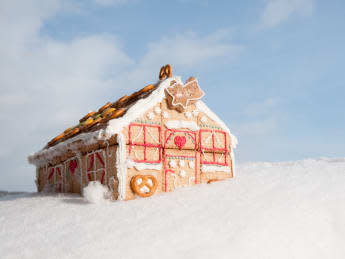 christmas cookies house in snow ...