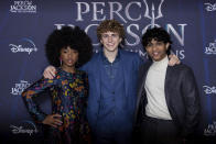 Leah Sava Jeffries, from left, Walker Scobell and Aryan Simhadri pose for photographers upon arrival at the premiere of the television series 'Percy Jackson and the Olympians' in London Saturday, Dec. 16, 2023. (Photo by Vianney Le Caer/Invision/AP)