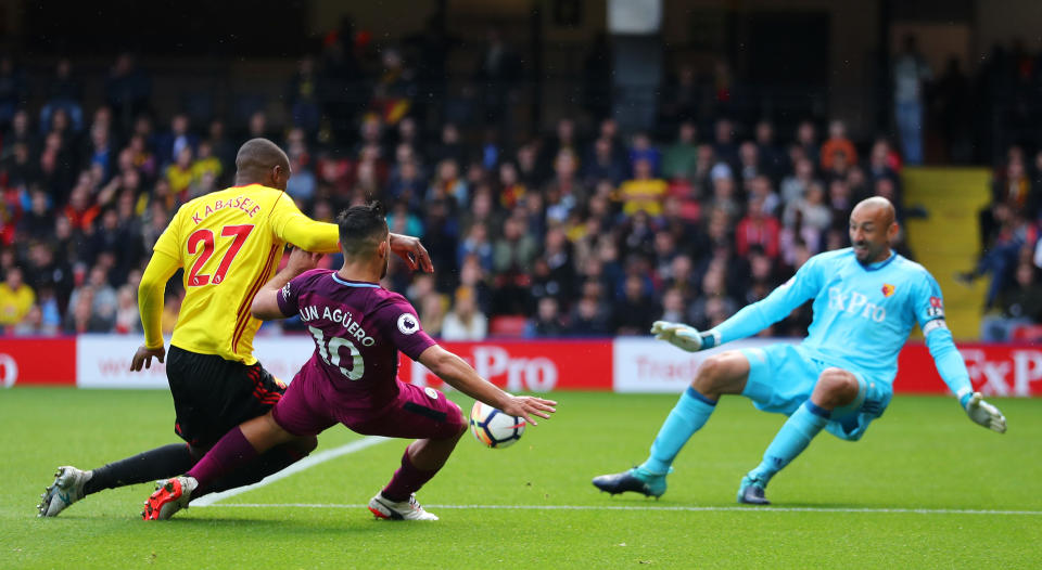 Sergio Aguero scores one of his three goals against Watford. (Getty)