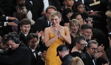 90th Academy Awards - Oscars Show - Hollywood, California, U.S., 04/03/2018 - Greta Gerwig reacts as Guillermo del Toro is announced as Best Director for "The Shape of Water." REUTERS/Lucas Jackson