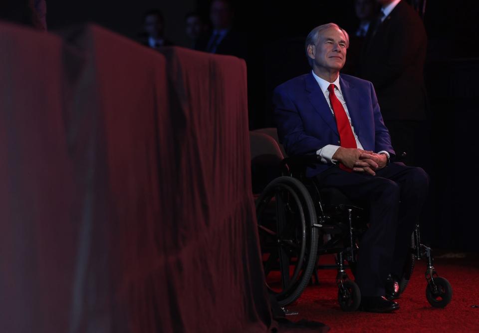 DALLAS, TEXAS - MAY 18: Texas Gov. Greg Abbott looks on as former U.S. President Donald Trump speaks during the NRA ILA Leadership Forum at the National Rifle Association (NRA) Annual Meeting & Exhibits at the Kay Bailey Hutchison Convention Center on May 18, 2024 in Dallas, Texas. (Photo by Justin Sullivan/Getty Images)