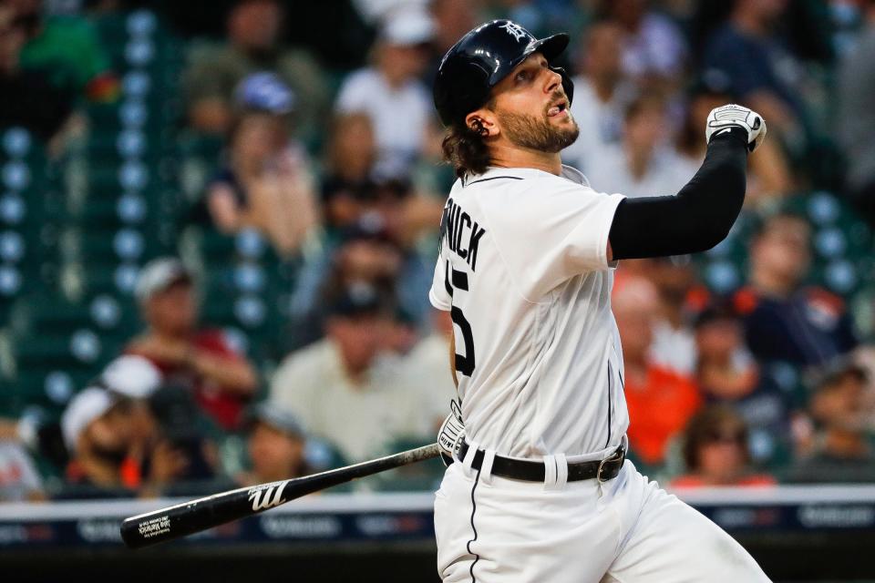 Detroit Tigers center fielder Jake Marisnick (15) hits a sacrifice fly against the Oakland Athletics during the eighth inning at Comerica Park in Detroit on Wednesday, July 5, 2023.