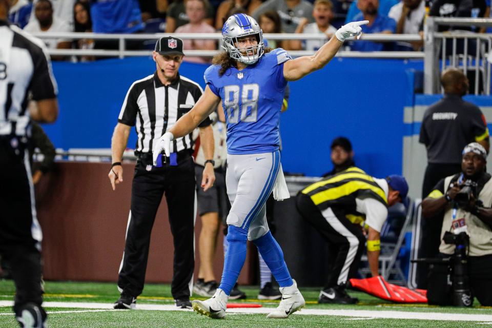 Lions tight end T.J. Hockenson celebrates a first down against Eagles during the first half on Sunday, Sept. 11, 2022, at Ford Field.