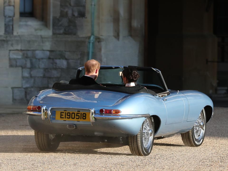 Prince Harry and Meghan Markle leave Windsor Castle by car to attend an evening reception at Frogmore House.