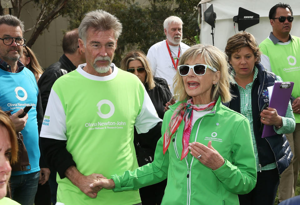 Olivia Newton-John and her husband John Easterling look on during the annual Wellness Walk and Research Runon September 16, 2018 in Melbourne, Australia. 