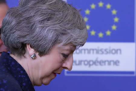 British Prime Minister Theresa May walks at the European Commission headquarters in Brussels, Belgium February 7, 2019. REUTERS/Yves Herman