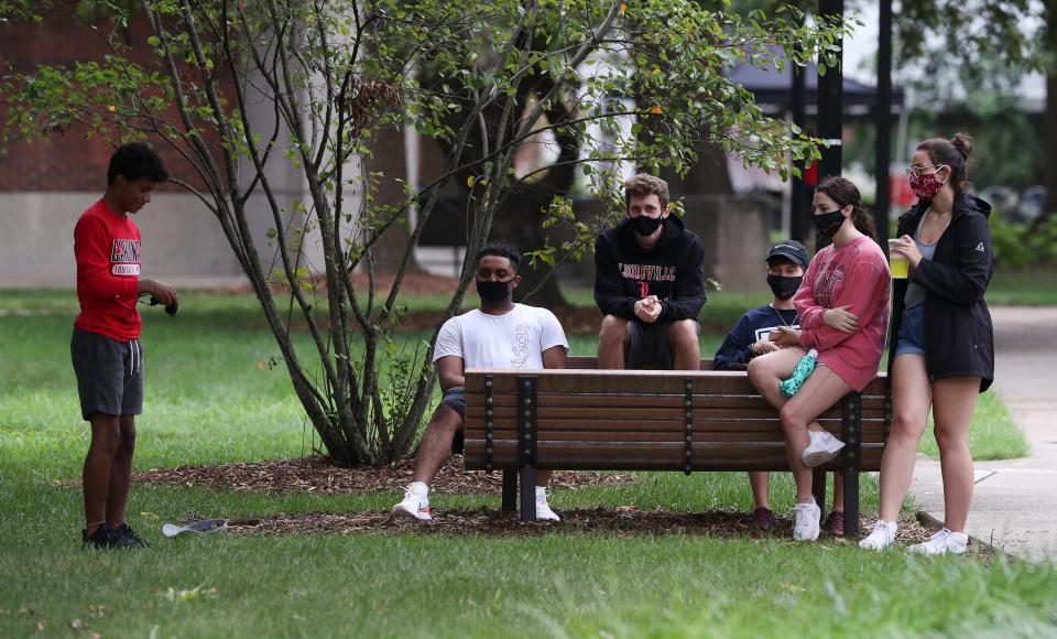 U of L students relax on the Belknap campus as the fall semester begins with CDC guidelines in place to protect students and staff from exposure to Covid-19 on Aug. 18, 2020.   