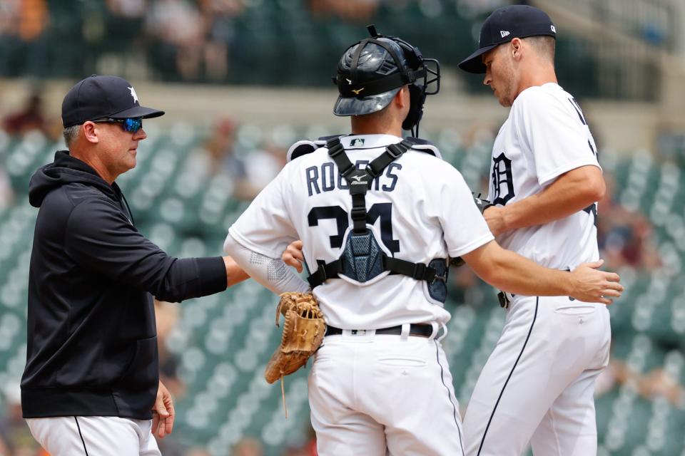 Jun 23, 2021; Detroit, Michigan, USA;  Detroit Tigers manager A.J. Hinch (14) take the ball to relieve starting pitcher Matt Manning (25) in the sixth inning against the St. Louis Cardinals at Comerica Park, June 23, 2021.