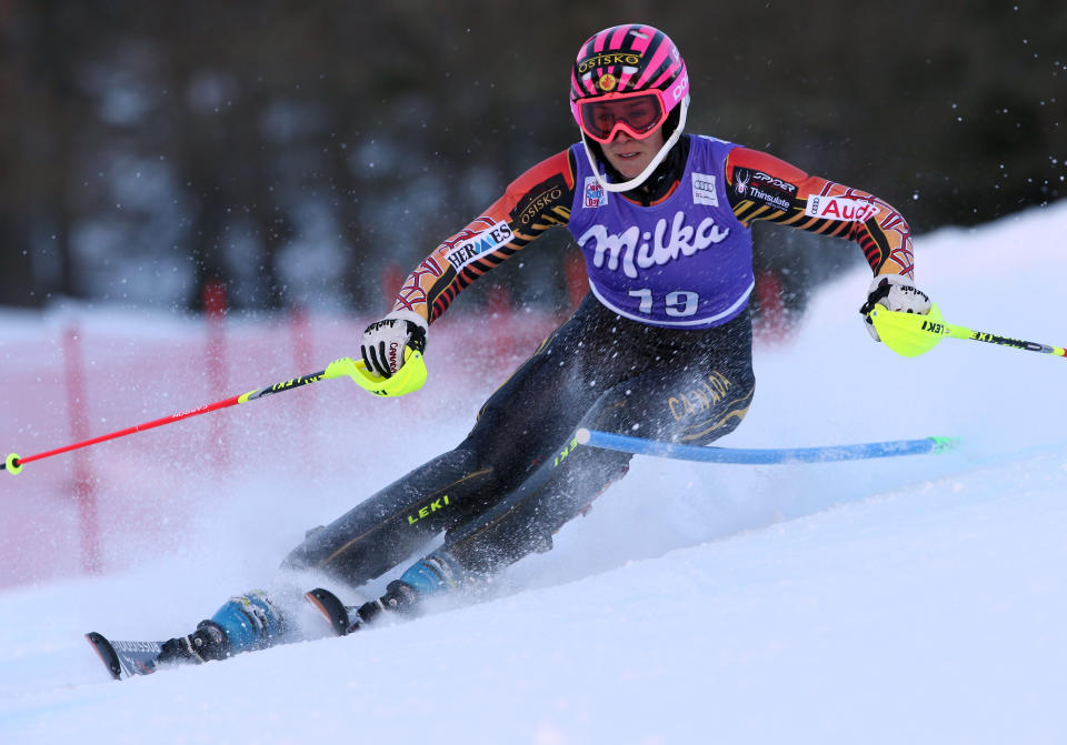 Canada's Marie-Michele Gagnon speeds down the course on her way to win a women's alpine ski World Cup super-combined event, in Altenmarkt-Zauchensee, Austria, Sunday, Jan. 12 , 2013. (AP Photo/Enrico Schiavi)