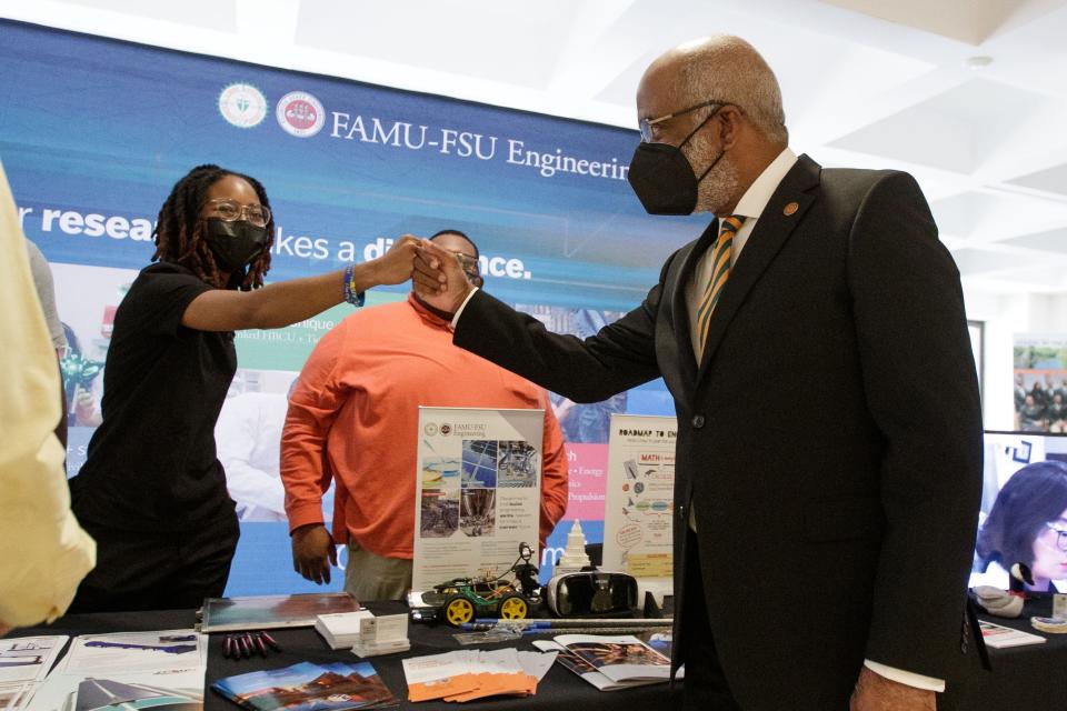 Florida A&M President Larry Robinson visits various booths set up by different FAMU programs in the Capitol during FAMU Day, Thursday, Feb. 24, 2022.