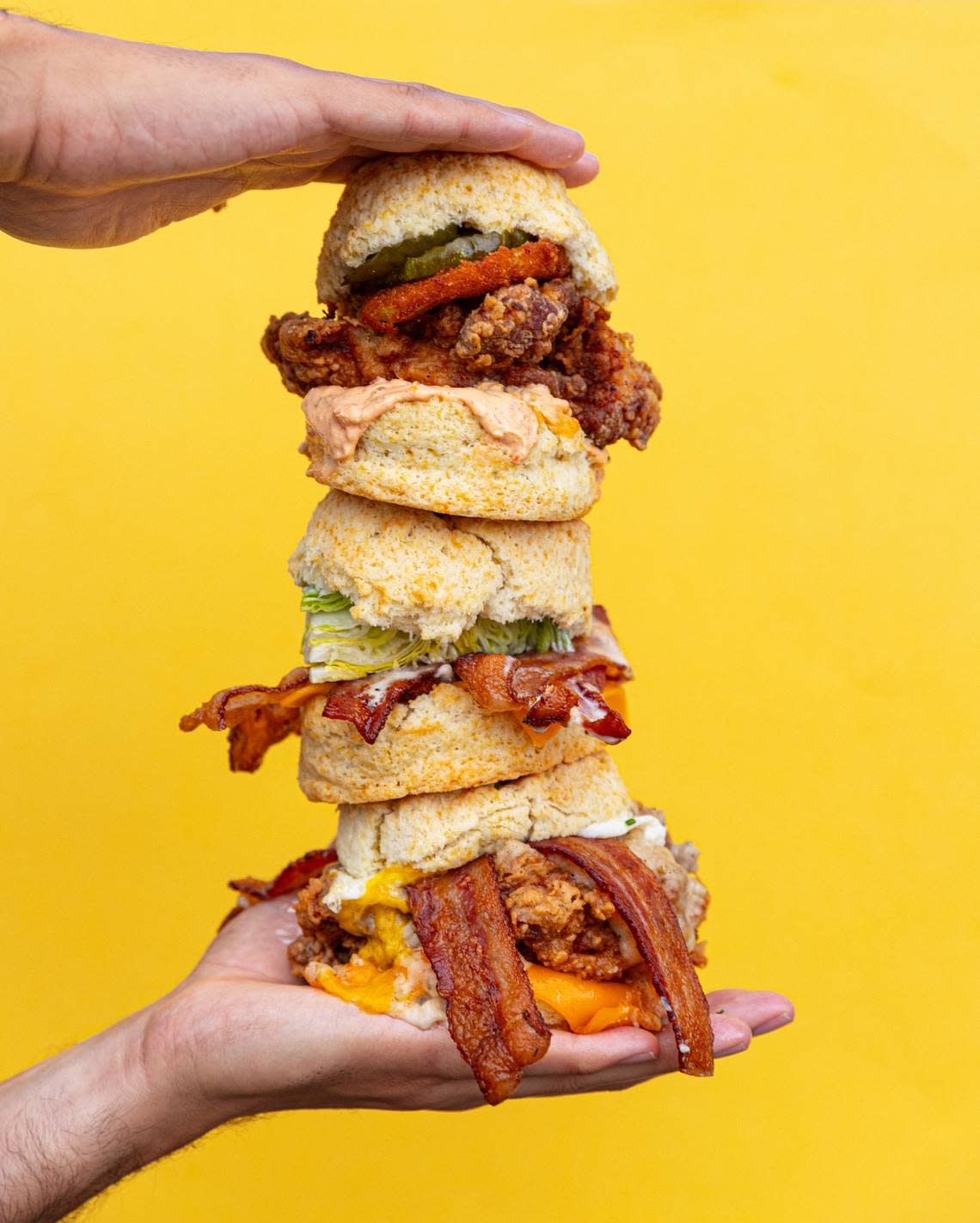 The Mama’s Boy, pictured at top from Biscuit Belly, features buttermilk fried chicken thigh, roasted jalapeno pimento cheese, pickles and a fried green tomato. In the middle is Towanda’s BLT and on the bottom is the Rockwell Supreme. Photo provided