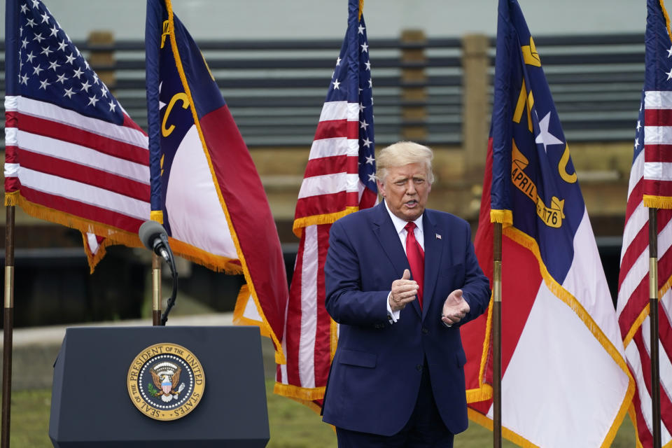 President Donald Trump leaves the stage after a speech on Wednesday, Sept. 2, 2020, in Wilmington, N.C. (AP Photo/Gerry Broome)