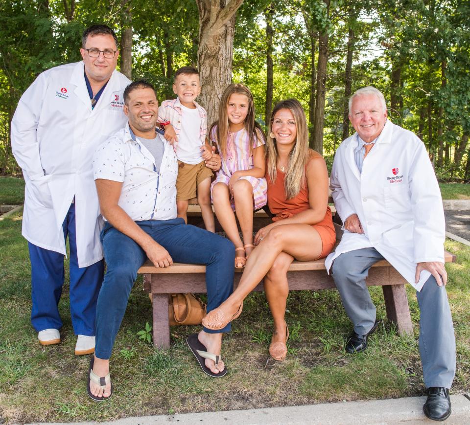 (From left to right) Dr. David Chesler, Charles DeFraia, Charlie DeFraia, Madison DeFraia, Crystal DeFraia and Dr. Richard Scriven reunite  Aug. 9, 2022.