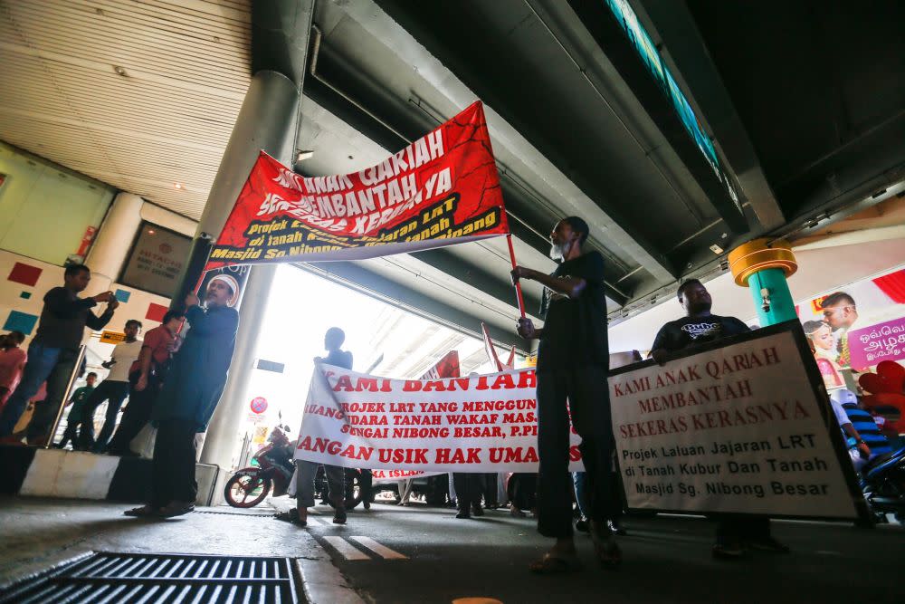 Demonstrators protest against the proposed alignment of the Light Rail Transit project over the site of Masjid Jamek Sungai Nibong Besar at Komtar June 21, 2019. — Picture by Sayuti Zainudin