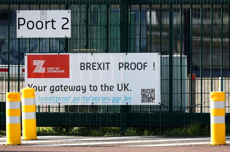 A banner is seem in the port of Zeebrugge after British police found bodies inside a lorry container in Grays, Essex, in Zeebrugge
