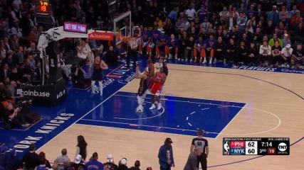 Joel Embiid scores and draws the foul