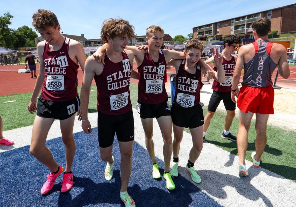 State College’s boys relay team reacts following their heat and placing third overall with a time of 7:48.47 in the boys Class 3A 4x800 meter relay finals during the PIAA State Track and Field Championships held Saturday at Seth Grove Stadium on the Shippensburg University campus in Shippensburg.