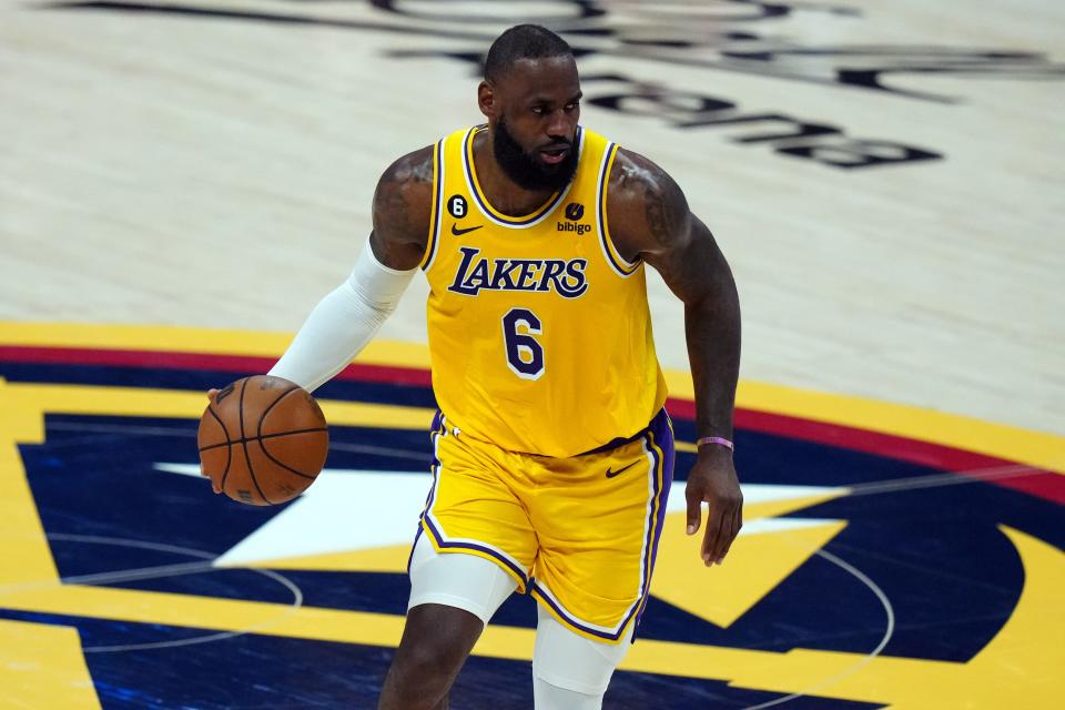 May 18, 2023; Denver, Colorado, USA; Los Angeles Lakers forward LeBron James (6) controls the ball against the Denver Nuggets in the first half during game two of the Western Conference Finals for the 2023 NBA playoffs at Ball Arena. Mandatory Credit: Ron Chenoy-USA TODAY Sports