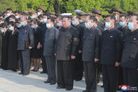 In this photo provided by the North Korean government, North Korean leader Kim Jong Un, center, attends a ceremony for Marshal of the Korean People's Army Hyon Chol Hae at a cemetery in Pyongyang, North Korea Sunday, May 22, 2022. Independent journalists were not given access to cover the event depicted in this image distributed by the North Korean government. The content of this image is as provided and cannot be independently verified. Korean language watermark on image as provided by source reads: "KCNA" which is the abbreviation for Korean Central News Agency. (Korean Central News Agency/Korea News Service via AP)