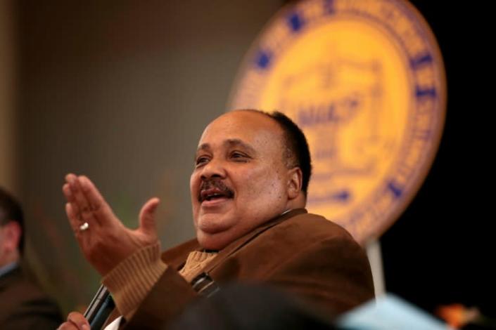 Martin Luther King III, speaking during the NAACP General Membership Meeting in Detroit, Michigan, is seeking to inspire the black community into political activism (AFP Photo/JEFF KOWALSKY)
