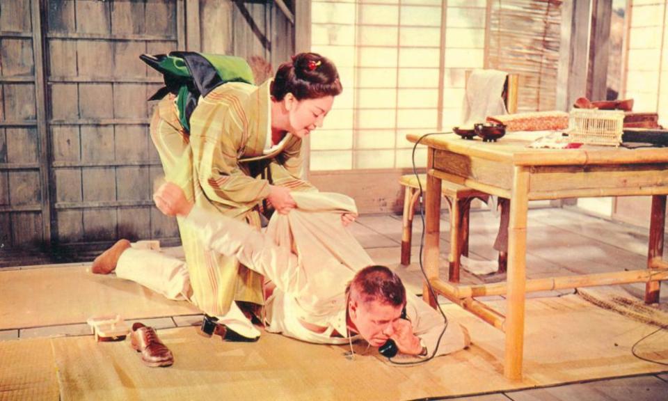 Machiko Kyo and Glenn Ford in The Teahouse of the August Moon, 1956.
