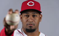 Cincinnati Reds relief pitcher Alexis Diaz poses for a photograph during MLB spring training baseball photo day in Goodyear, Ariz., Tuesday, Feb. 21, 2023. (AP Photo/Ross D. Franklin)