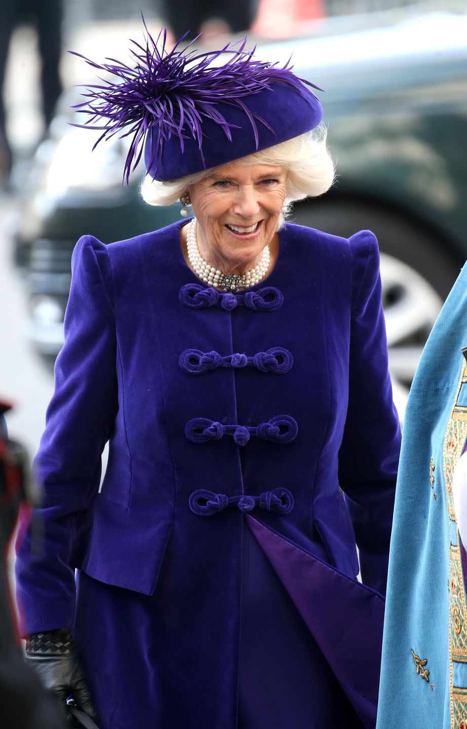<p>The Duchess of Cornwall wore rich royal purple velvet and a matching hued hat with feather plumes to the Commonwealth Day Service at Westminster Abbey.</p>