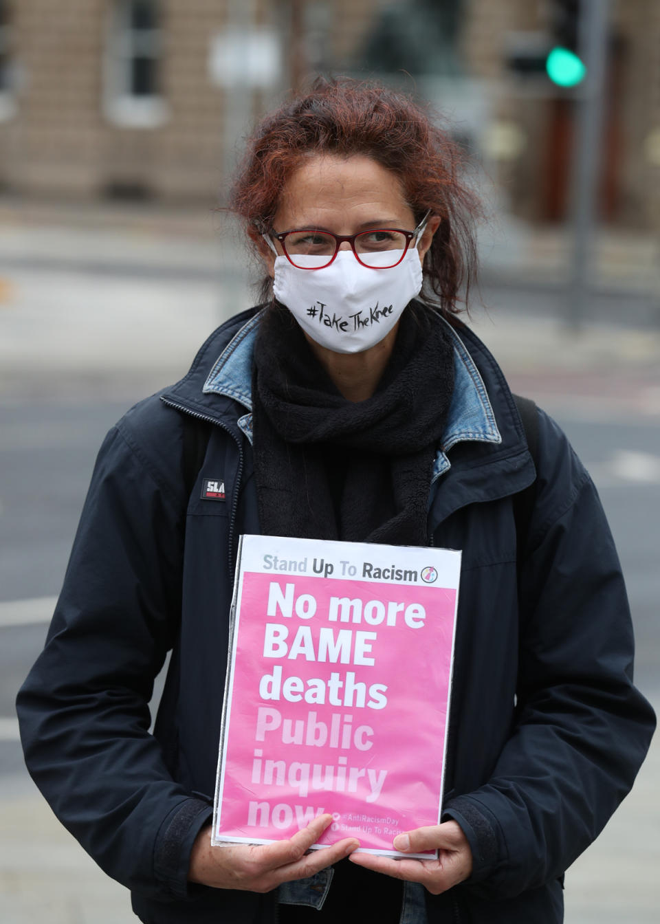 A person holds a sign during a Black Lives Matter protest in Edinburgh, following a raft of protests that took place across the UK over the weekend. The protests were sparked by the death of George Floyd, who was killed on May 25 while in police custody in the US city of Minneapolis.