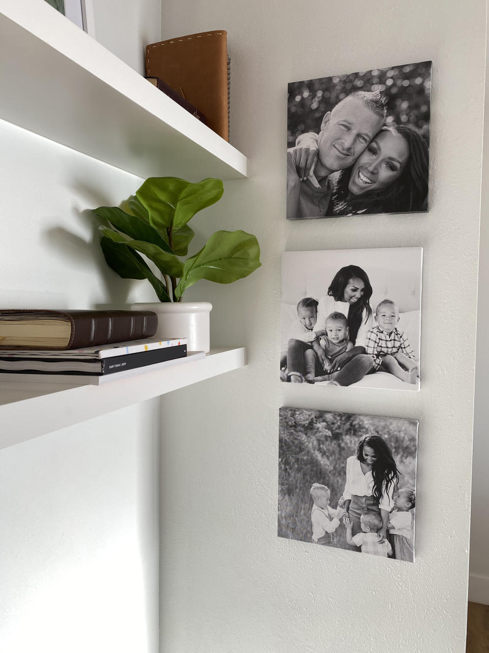 This photo provided by Chatbooks shows their photo wall tiles. Chatbooks lets you connect your Instagram or camera roll to create beautiful photo books, prints, cards – or these lovely wall tiles. Your color or b&w images are printed on square canvas frames equipped with moveable adhesive backing, perfect for renters and owners. (Chatbooks via AP)