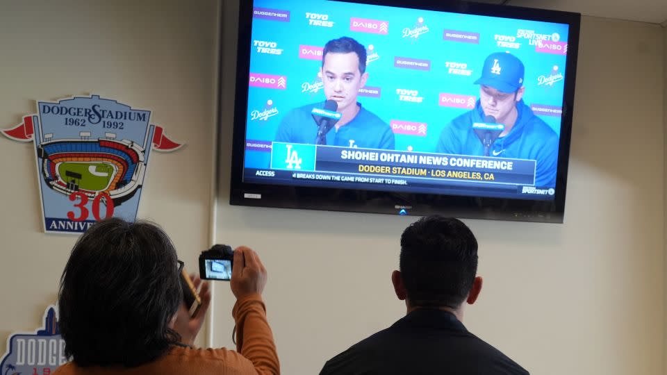 Ohtani takes part in a press conference with Dodgers employee Will Ireton. - Kirby Lee/USA Today Sports/Reuters