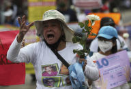 A person shouts "Where are our children?" during a march in remembrance of those who have disappeared, on Mother's Day in Mexico City, Monday, May 10, 2021. (AP Photo/Fernando Llano)