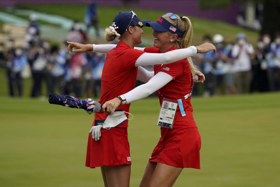 Nelly Korda, of the United States, left, celebrates with her sister Jessica Korda after winning the gold medal on the 18th hole during the final round of the women's golf event at the 2020 Summer Olympics.during the final round of the women's golf event at the 2020 Summer Olympics, Saturday, Aug. 7, 2021, at the Kasumigaseki Country Club in Kawagoe, Japan. (AP Photo/Matt York)