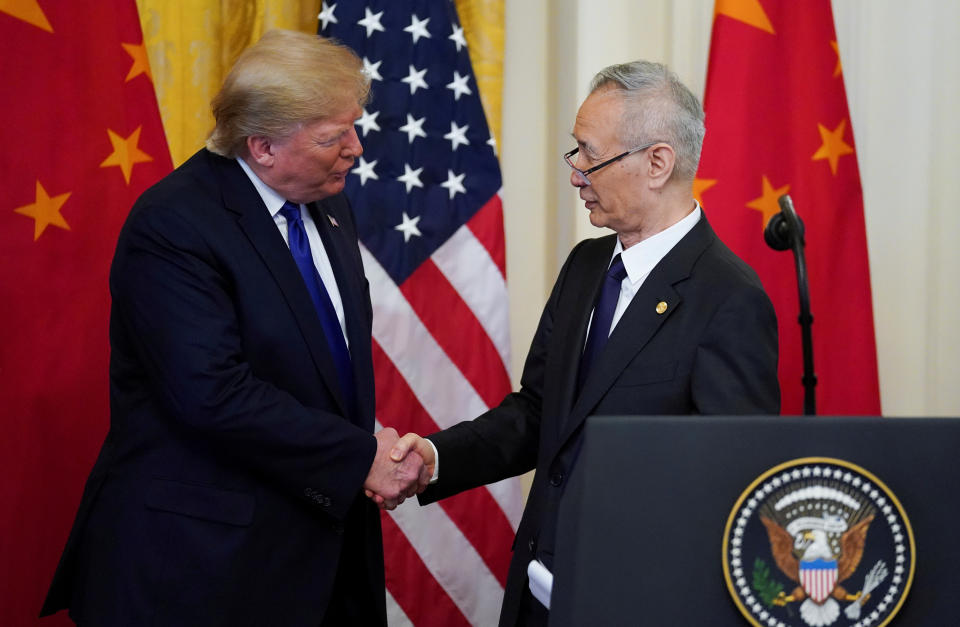 U.S. President Donald Trump shakes hands with Chinese Vice Premier Liu He during a signing ceremony for "phase one" of the U.S.-China trade agreement in the East Room of the White House in Washington, U.S., January 15, 2020. REUTERS/Kevin Lamarque