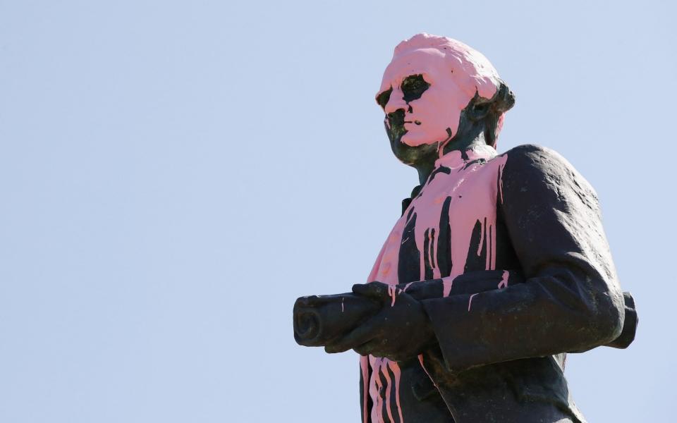 A statue of Captain Cook vandalised in Melbourne on Australia Day, 2018 - Getty