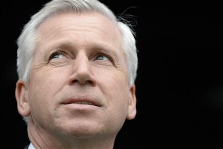 Newcastle United's manager Alan Pardew looks on ahead of their English Premier League soccer match against Aston Villa at St James' Park in Newcastle, northern England February 23, 2014. REUTERS/Nigel Roddis