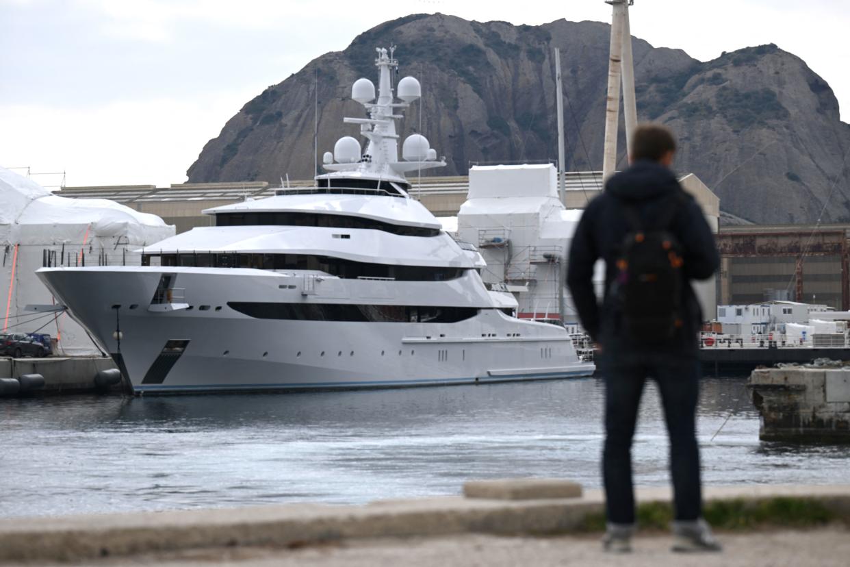 A picture taken on March 3, 2022 in a shipyard of La Ciotat, near Marseille, southern France, shows a yacht, Amore Vero, owned by a company linked to Igor Sechin, chief executive of Russian energy giant Rosneft. (AFP / NICOLAS TUCAT)