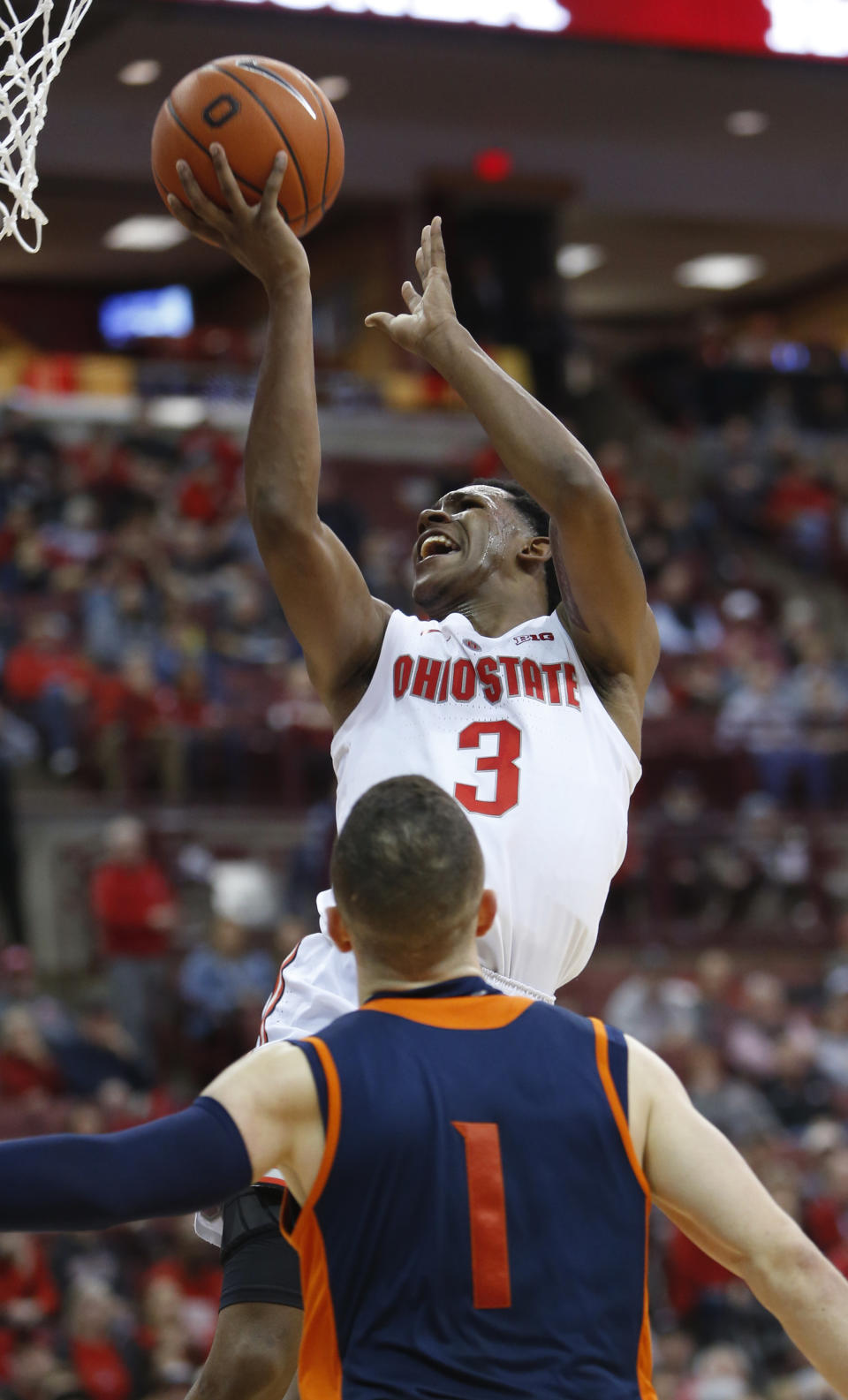 Ohio State's C.J. Jackson, top, shoots over Bucknell's Kimbal Mackenzie during the second half of an NCAA college basketball game Saturday, Dec. 15, 2018, in Columbus, Ohio. Ohio State beat Bucknell 73-71. (AP Photo/Jay LaPrete)