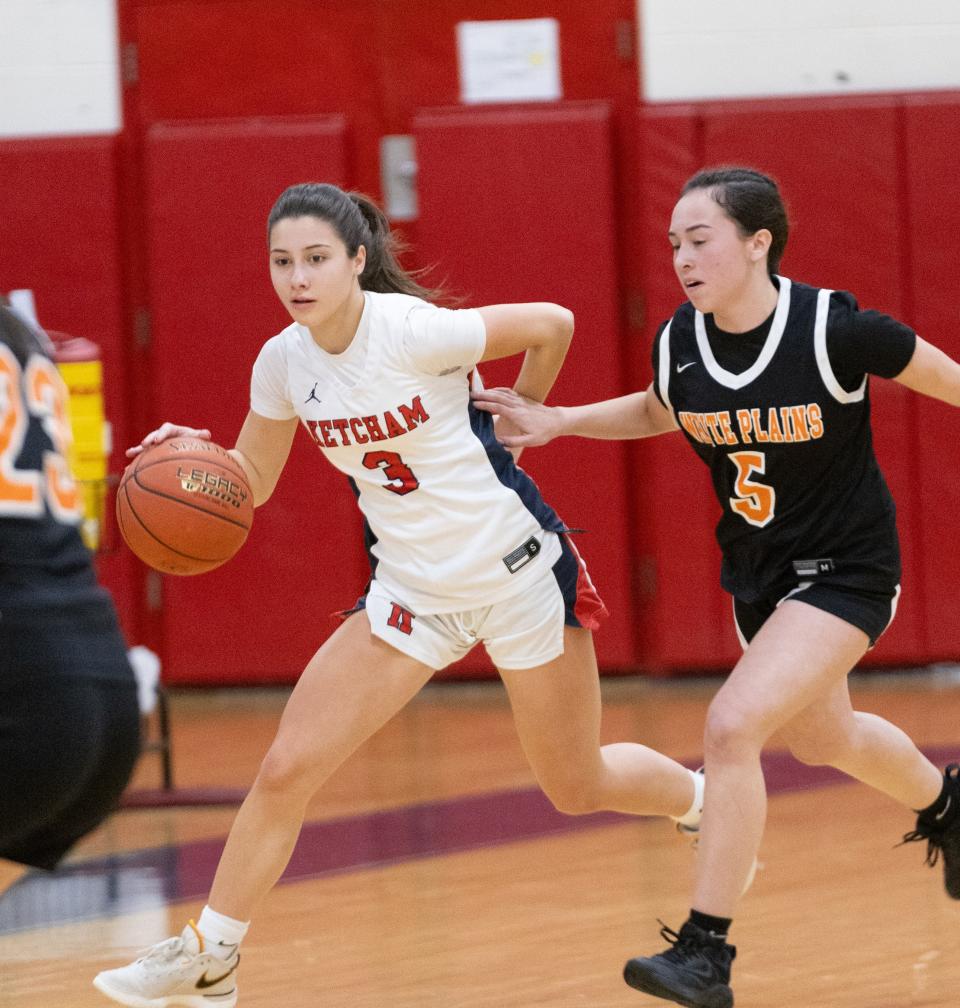 Ketcham's Jules Belmonte drives the ball up court against White Plains during a Dec. 22, 2023 girls basketball game.